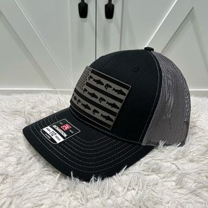 Laser engraved American flag fish. Richardson 112 trucker hat.